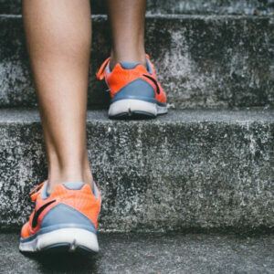 walking a stairway in sneakers