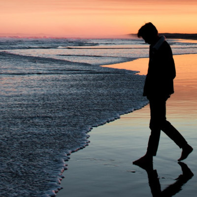 Walking at the beach during sunset